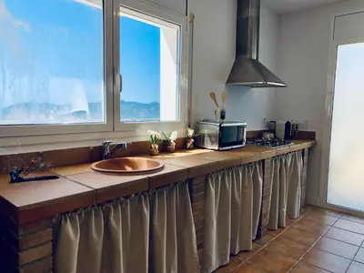 Una cocina o zona de cocina en Hauzify I Casa Gaditana