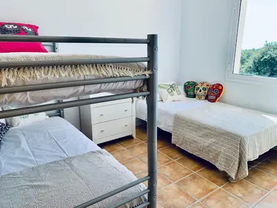 Cama o camas de una habitación en Hauzify I Casa Gaditana