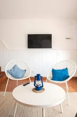 Una televisión o centro de entretenimiento en Casita al lado mar en S'Agaró