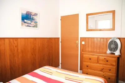 Cama o camas de una habitación en Casita al lado mar en S'Agaró