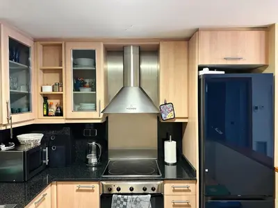 Una cocina o zona de cocina en Unique apartment with direct sea view along the beach in S'Abanell Central Park Blanes