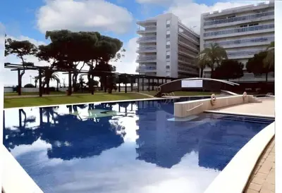 Piscina en o cerca de Unique apartment with direct sea view along the beach in S'Abanell Central Park Blanes