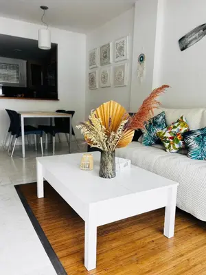 Zona de estar de Unique apartment with direct sea view along the beach in S'Abanell Central Park Blanes