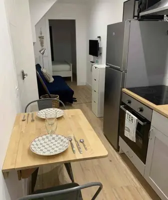 Una cocina o zona de cocina en Moderno Loft a 2 minutos de la playa, en pleno centro histórico