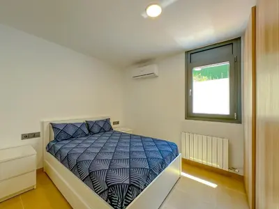 Cama o camas de una habitación en Vivalidays Dali - Costa Brava