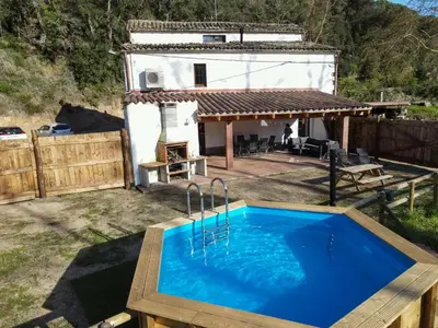 Piscina en o cerca de Casa Rural Can Ricós - El Mirador del Montseny