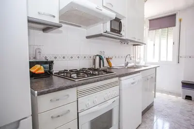 Una cocina o zona de cocina en AL46 - Apartamento moderno playa Fenals