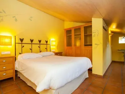 Cama o camas de una habitación en El Atico de la Muralla en el Centro de Girona