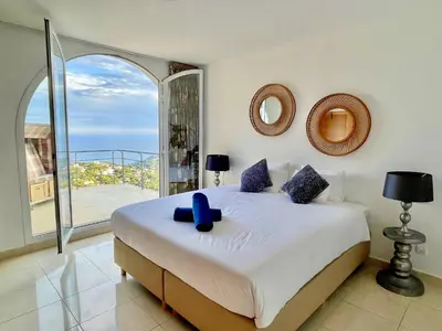 Cama o camas de una habitación en Villa Joie de Vivre