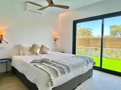 Cama o camas de una habitación en Villa Joie de Vivre