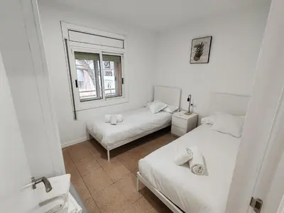 Cama o camas de una habitación en Apartamentos Baymar Playa de Aro