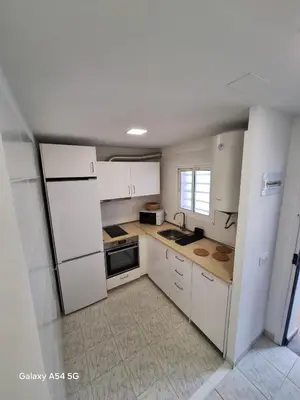Una cocina o zona de cocina en Apartamentos Baymar Playa de Aro
