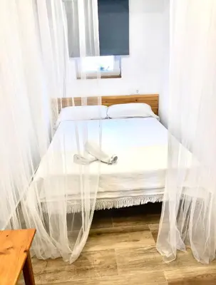 Cama o camas de una habitación en Casa Beach lloret de mar