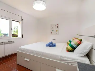 Cama o camas de una habitación en Holiday Home Can Pau by Interhome