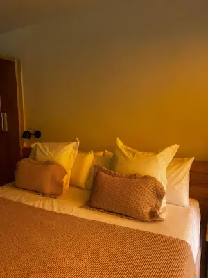 Cama o camas de una habitación en Apartament SUITES vista mar Sa Tuna