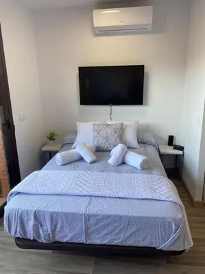 Cama o camas de una habitación en Apartamento Loft, LLoret de Mar