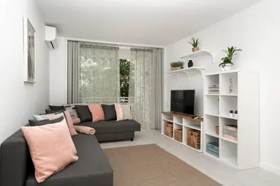 Una televisión o centro de entretenimiento en Bitacora Comfortable quiet flat near the beach