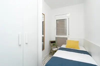 Cama o camas de una habitación en Bitacora Comfortable quiet flat near the beach