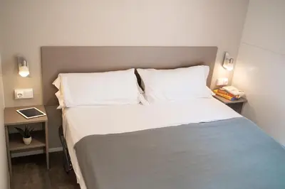 Cama o camas de una habitación en Càmping Bellsol