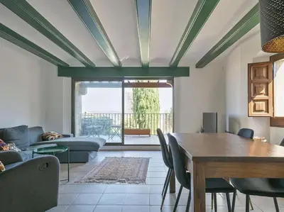 Zona de estar de Rincón de Encanto en Pals
