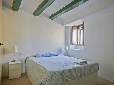 Cama o camas de una habitación en Rincón de Encanto en Pals