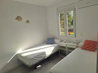 Cama o camas de una habitación en Roger Apartment 29 Platja d'Aro