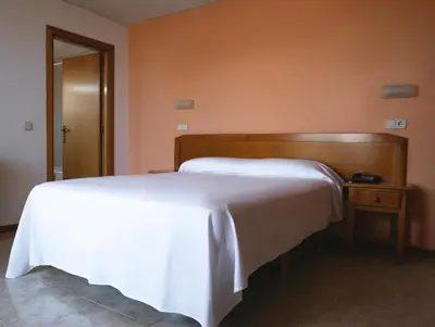 Cama o camas de una habitación en Vintage Hotel Mercedes