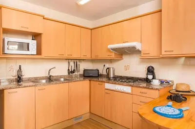 Una cocina o zona de cocina en Apartaments Els Llorers