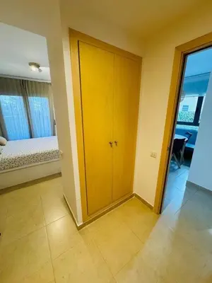 Cama o camas de una habitación en Maravilloso piso de las playas Fenals y Sa Boadella