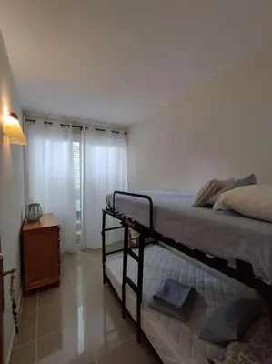 Cama o camas de una habitación en Peral 32 - Baix amb Pàrquing