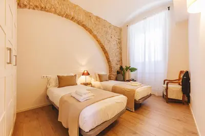 Cama o camas de una habitación en Bravissimo Llebre Duplex, with patio