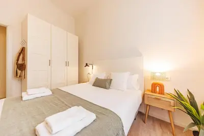 Cama o camas de una habitación en Bravissimo Llebre Duplex, with patio