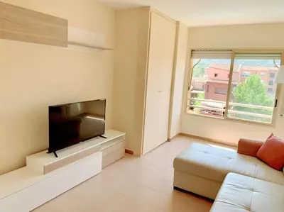 Una televisión o centro de entretenimiento en Apartamento Santa Cristina