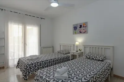 Cama o camas de una habitación en Apartamento Armonia
