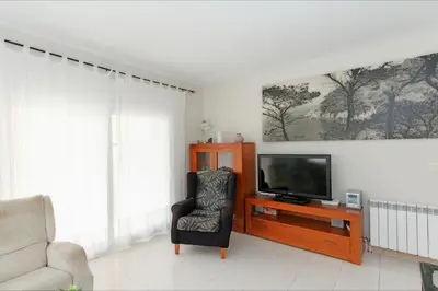 Una televisión o centro de entretenimiento en Apartamento Armonia