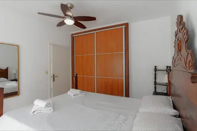 Cama o camas de una habitación en Apartamento Armonia