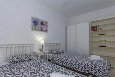 Cama o camas de una habitación en Apartamento Armonia