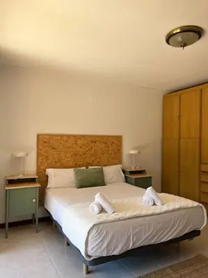 Cama o camas de una habitación en Amplia casa a 10 min de la playa