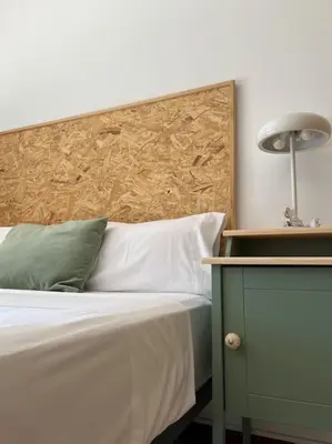 Cama o camas de una habitación en Amplia casa a 10 min de la playa