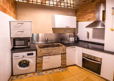 Una cocina o zona de cocina en St Domènec apartment