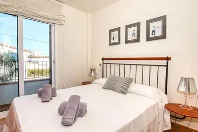 Cama o camas de una habitación en Apartamento con Piscina céntrico