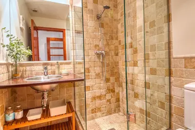 Un baño de Apartamento con Piscina céntrico