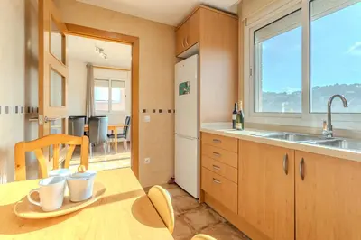 Una cocina o zona de cocina en Villa Luz Lloret con Piscina