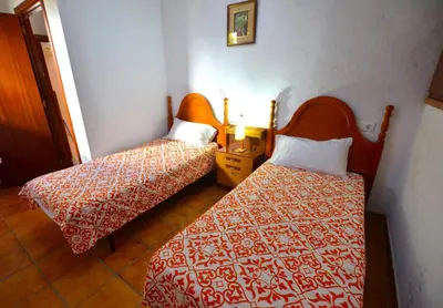 Cama o camas de una habitación en Villa Fernando 12 personas 8km Lloret de Mar