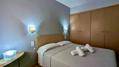 Cama o camas de una habitación en EVH-101 Apartamento en primera línea