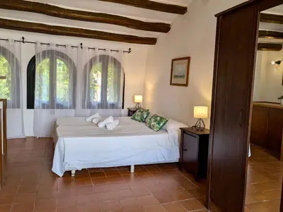 Cama o camas de una habitación en EVH-102 Casa dentro del castillo de Tossa de Mar