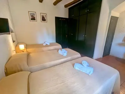 Cama o camas de una habitación en EVH-102 Casa dentro del castillo de Tossa de Mar