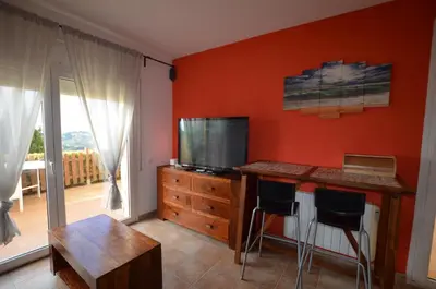 Una televisión o centro de entretenimiento en Villa Mimosa 8 people Lloret de Mar
