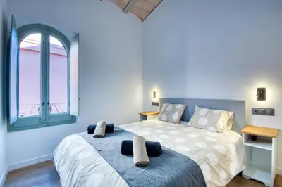 Cama o camas de una habitación en Pati Blau 1