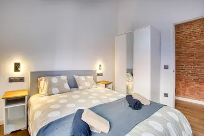 Cama o camas de una habitación en Pati Blau 1